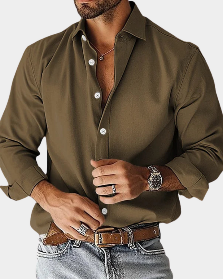 Men's stylish button-down shirt in a tailored fit. Versatile smart casual top made with breathable, easy-care fabric.