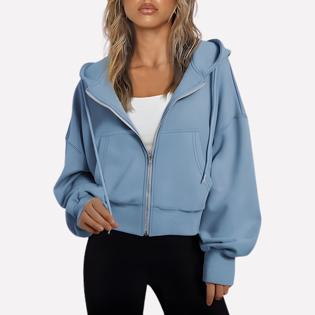 Modern women's cropped drawstring hoodie, offering a relaxed and stylish fit.