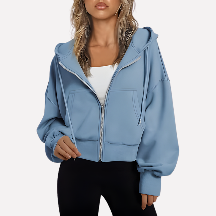 Modern women's cropped drawstring hoodie, offering a relaxed and stylish fit.