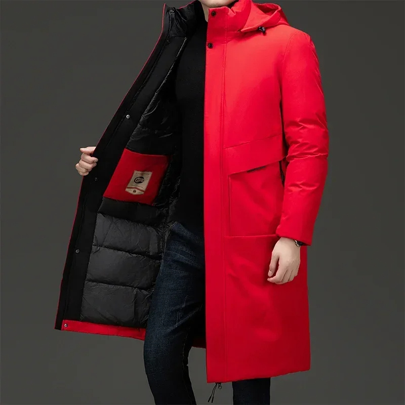 Black men's hooded long winter coat for ultimate warmth. Stylish outerwear, ideal for cold weather fashion.