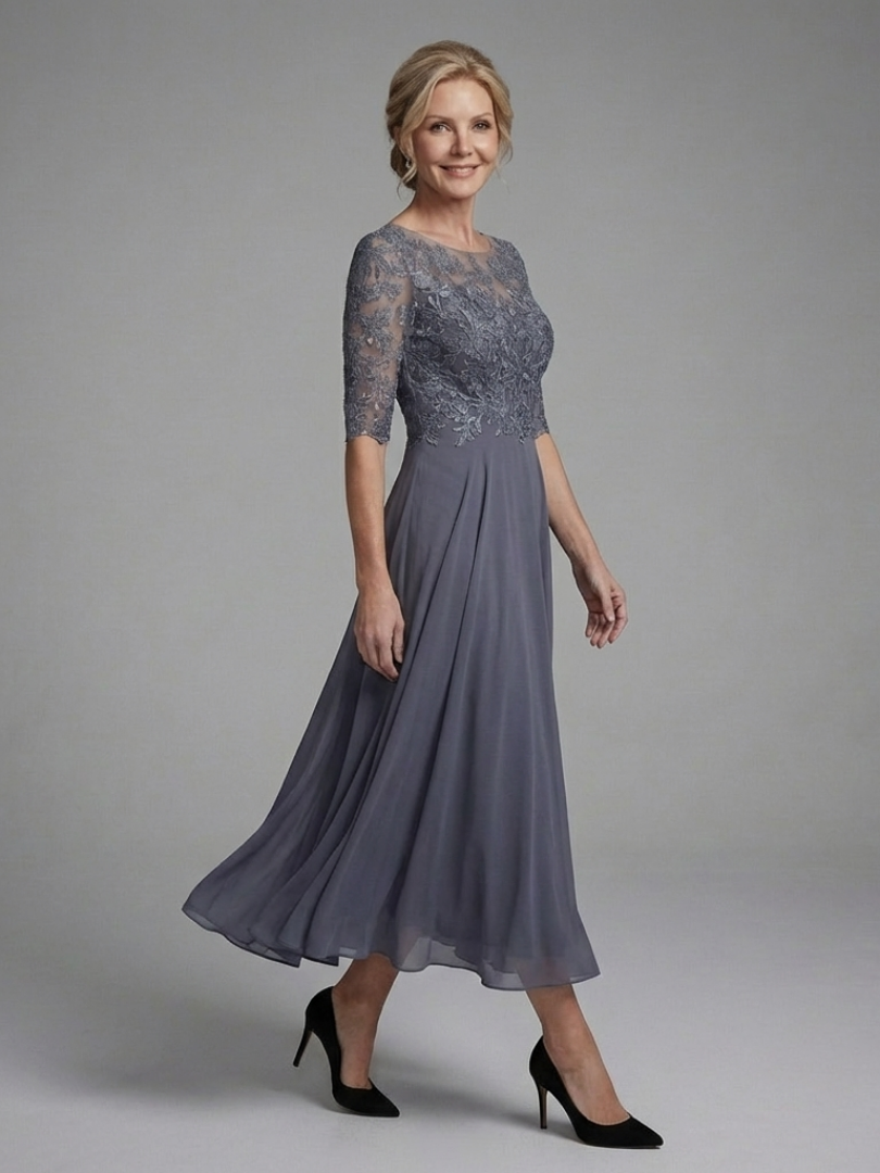 Burgundy A-line midi dress for women, featuring lace bodice & sheer sleeves. Ideal for formal events.