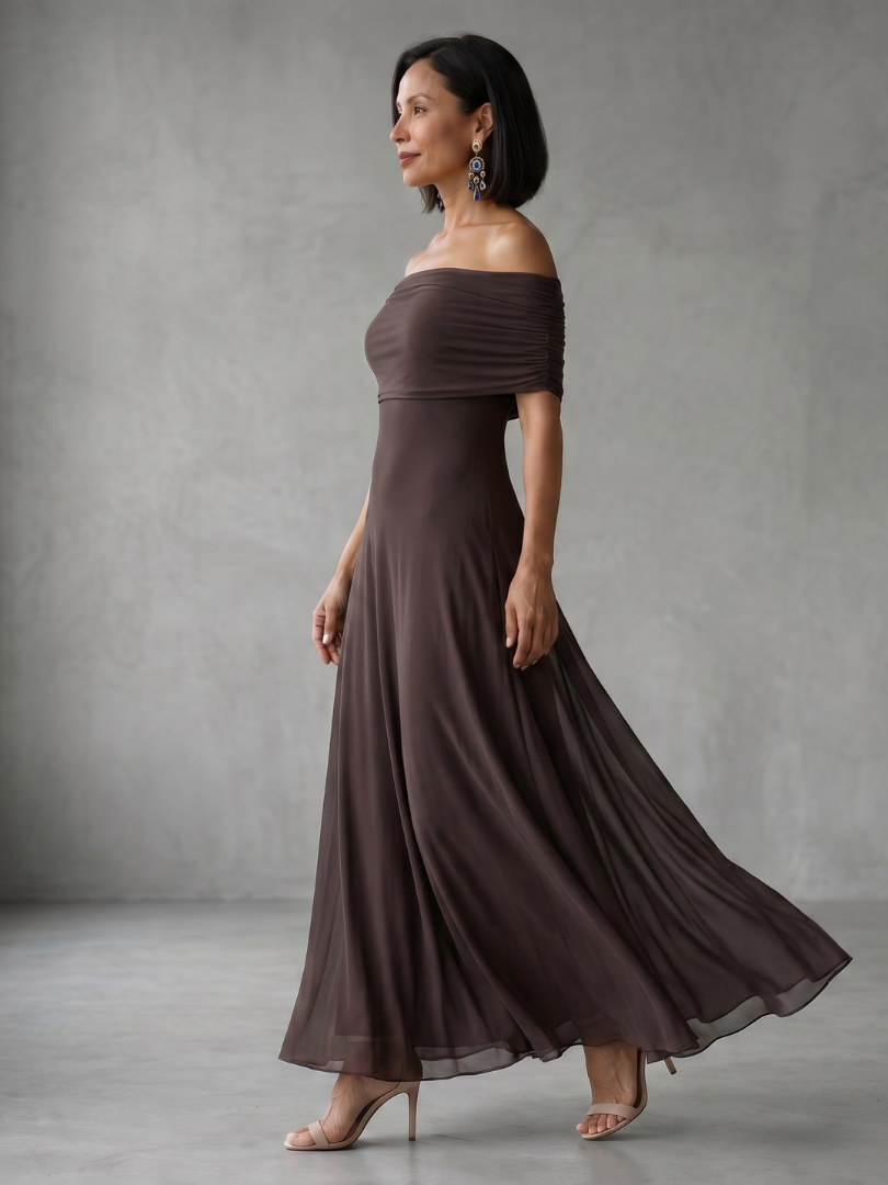 Chic white off-shoulder midi dress with flattering drape, ideal for summer special occasions.