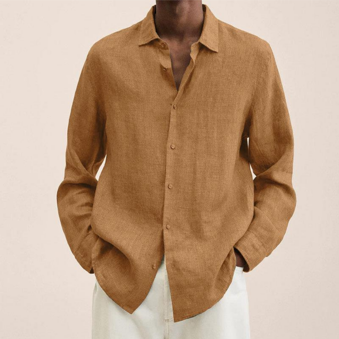 Smart casual men's long-sleeve button-up shirt, neatly tucked for a refined and polished appearance.