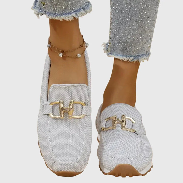 Comfortable women's orthopedic trainers with arch support & slip-on design for easy wear.