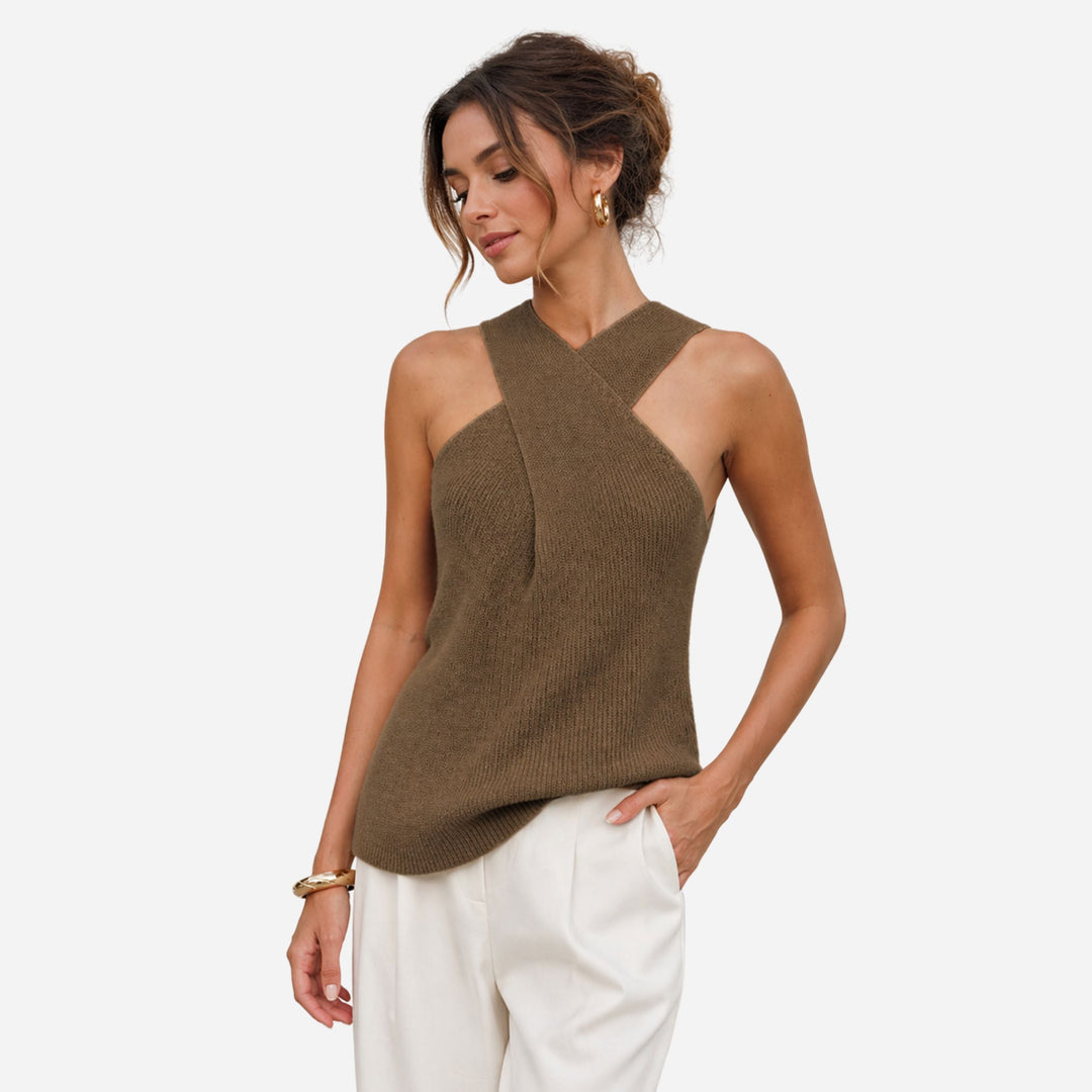 Women's fitted black ribbed cross halter tank top, perfect for stylish summer casual wear.
