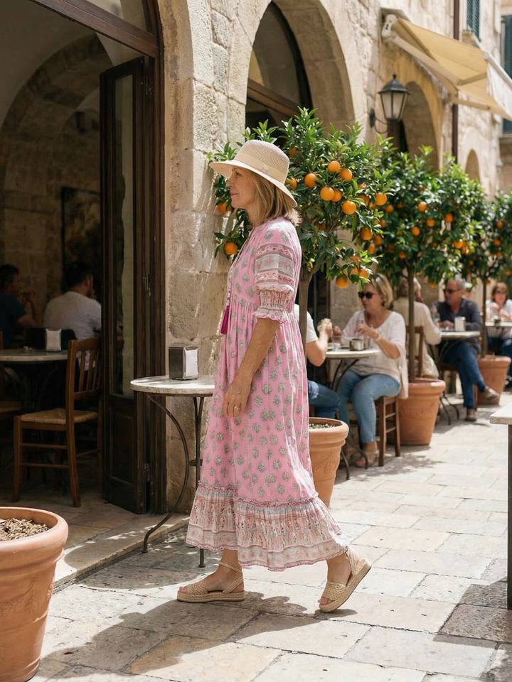 Relaxed fit women's midi dress with vibrant floral print & flattering V-neck, great for casual summer outings.