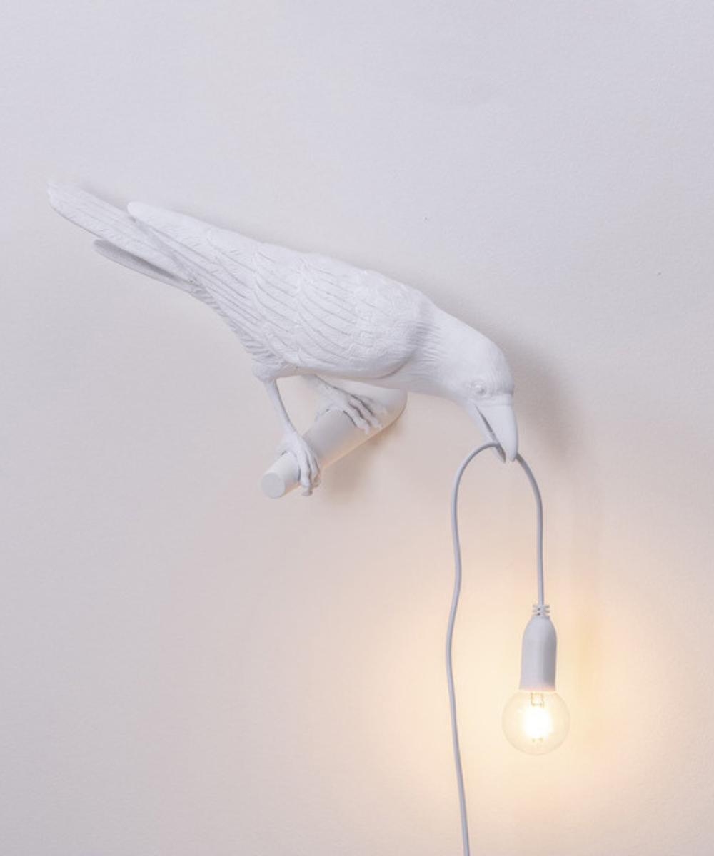Unique black crow table lamp, an artistic bird lamp offering distinctive lighting and home decor.