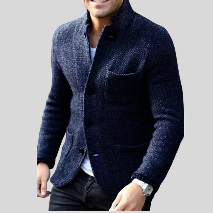 Stylish men's quilted blazer with a sophisticated button-front design, offering warmth and a smart look.