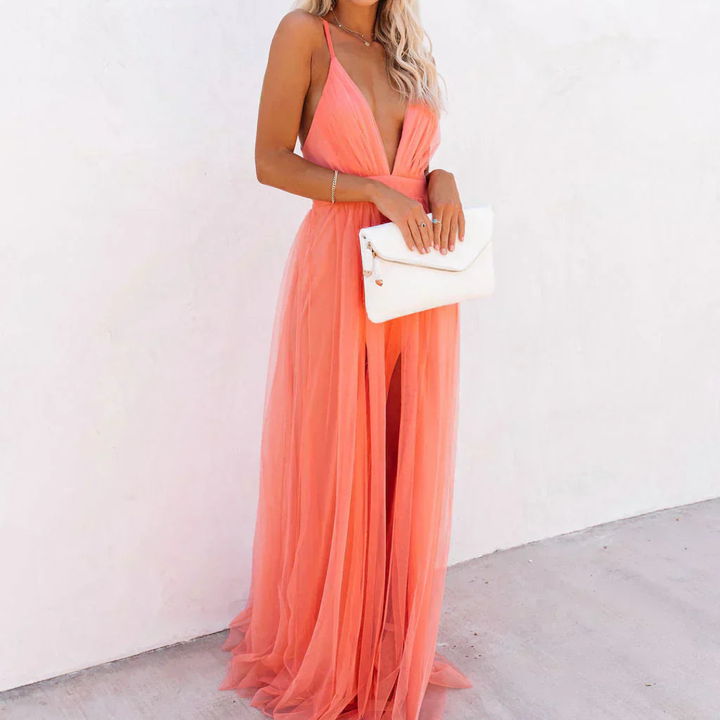 Versatile coral maxi dress for women, a light flowy option suitable for summer weddings or evening events.