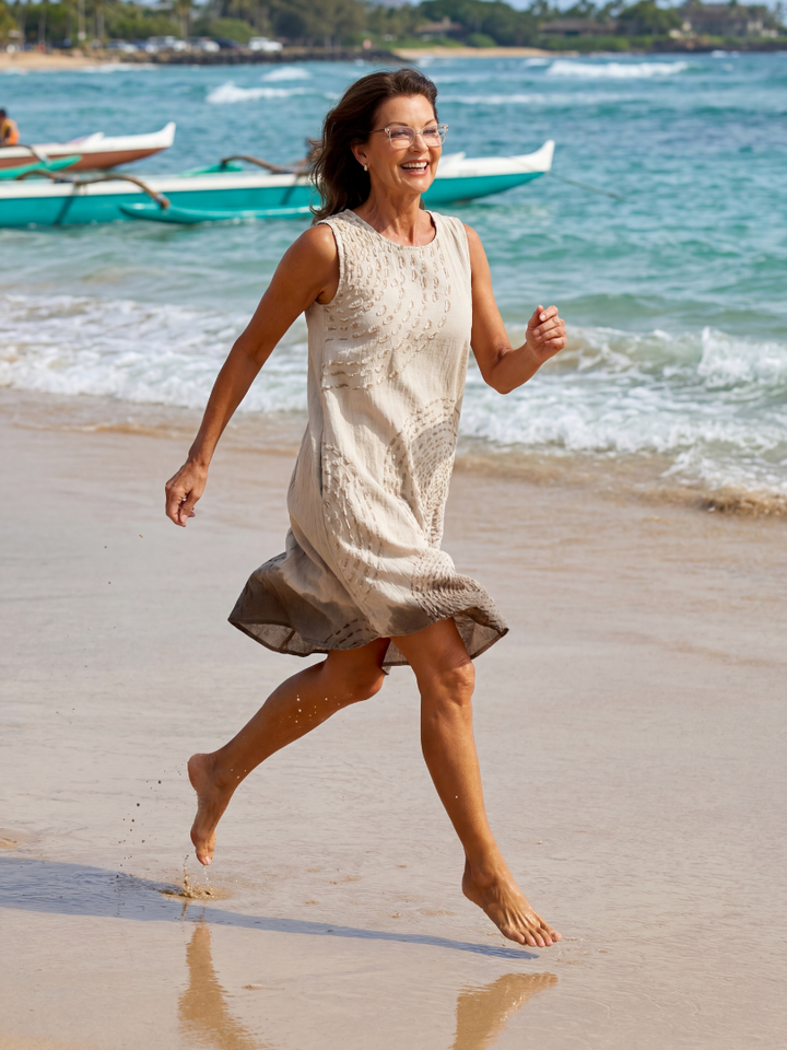 Stylish white textured midi dress for women, relaxed fit perfect as a versatile summer dress.