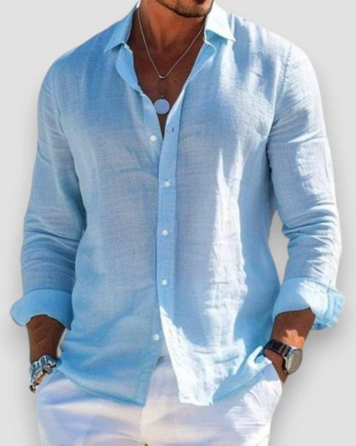 Man wearing a relaxed fit short sleeve summer shirt, showcasing effortless casual style for warm weather.