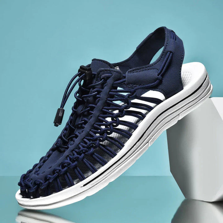 Adjustable lace men's closed toe mesh sandals, offering comfort and support for summer wear.