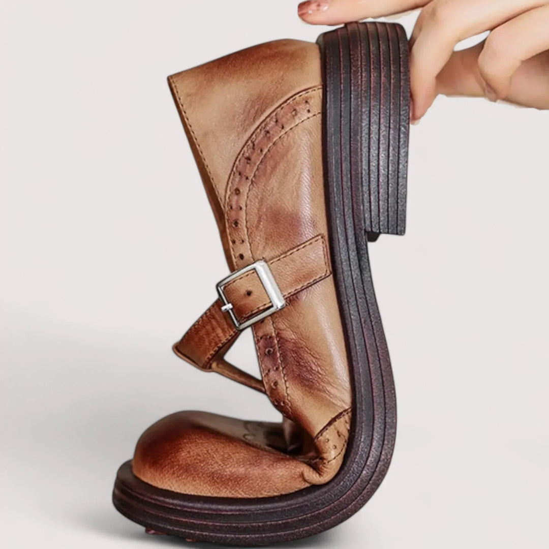 Comfortable brown Mary Jane strap shoes for women, showcasing timeless brogue accents and classic design.