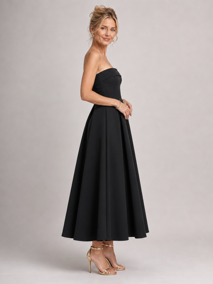 Sophisticated strapless structured bodice midi dress for women, ideal for cocktail parties & special occasions.