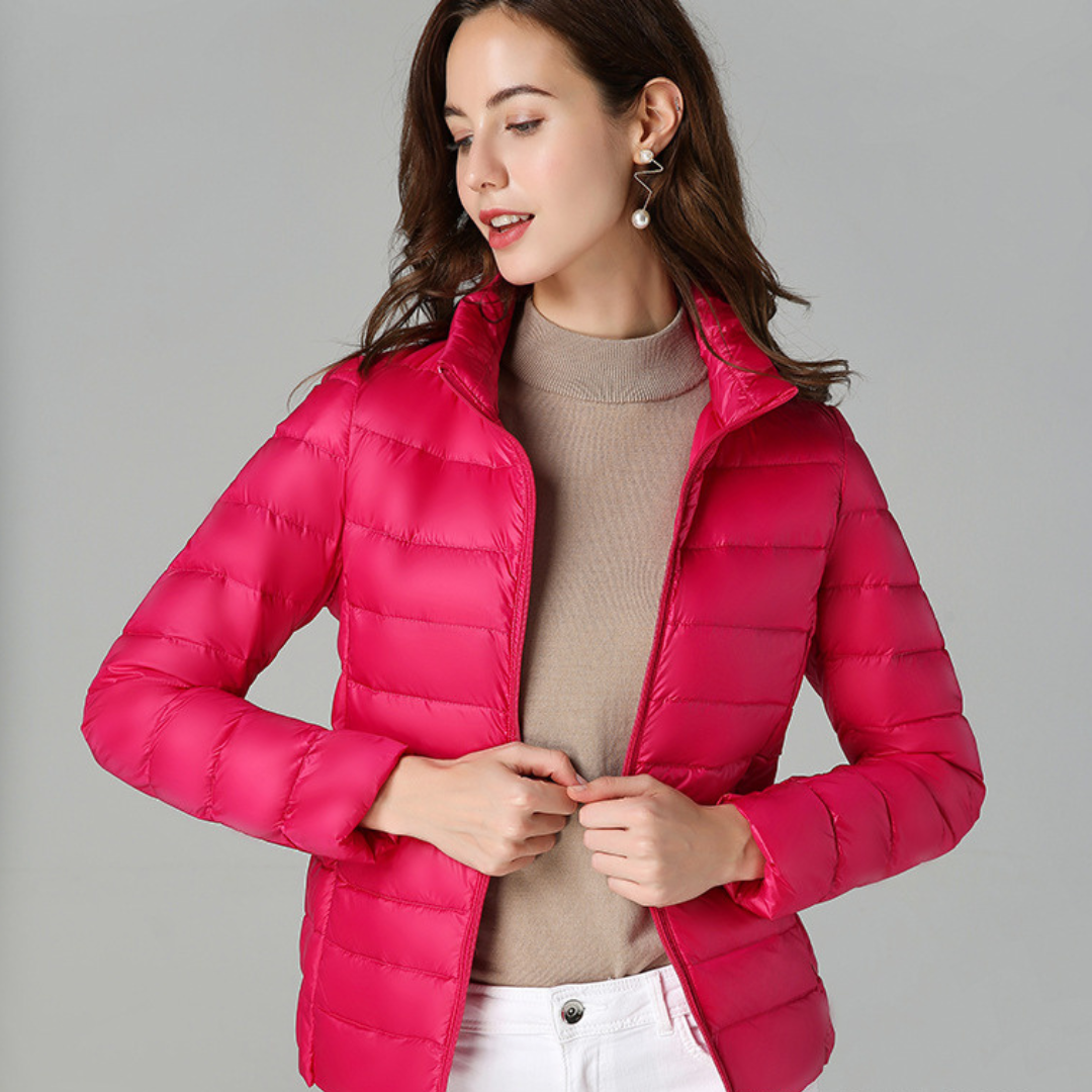 Women's ultralight waterproof rain jacket, stylish and versatile for outdoor explorations and all-weather casual use.