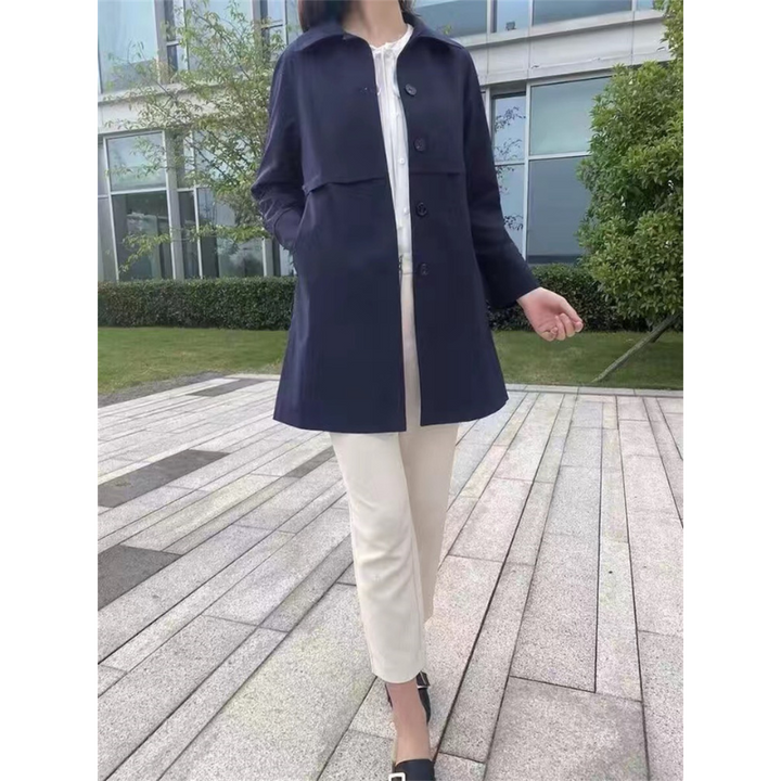 Stylish women's trench coat with adjustable tie-waist, perfect for versatile autumn looks.