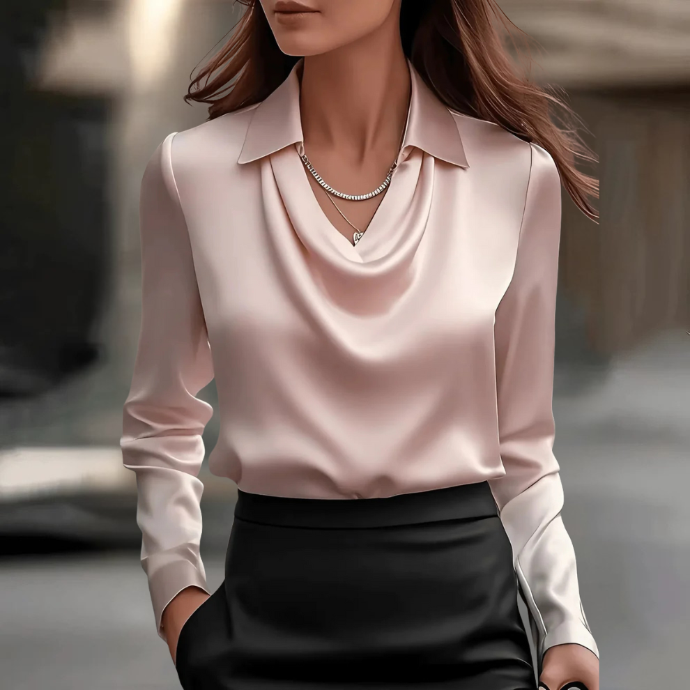 Sophisticated women's top, offering effortless style. A comfortable and elegant work blouse.