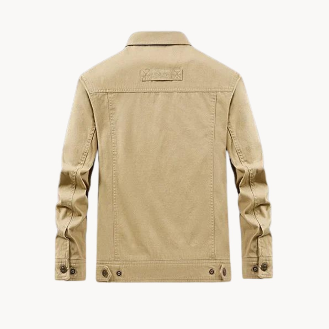 Close-up of durable fabric & secure fasteners on a men's versatile fall cargo jacket, highlighting quality.