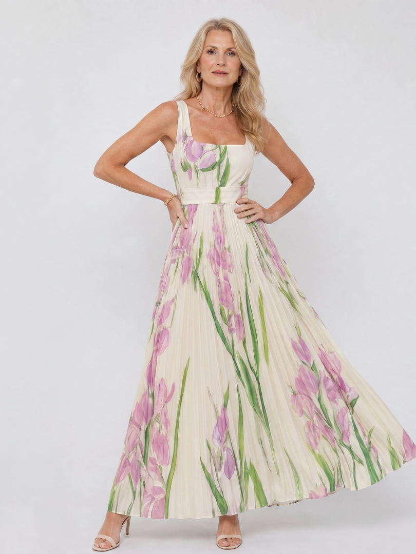 Stylish sleeveless midi dress for women, featuring a square neck & delicate pleats. Summer ready.