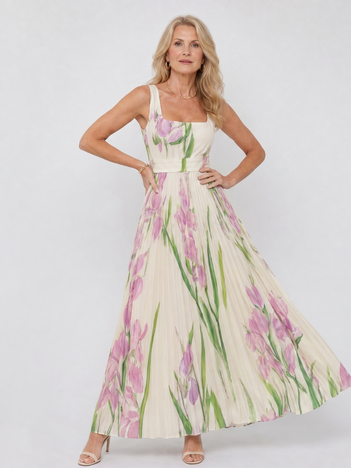 Stylish sleeveless midi dress for women, featuring a square neck & delicate pleats. Summer ready.