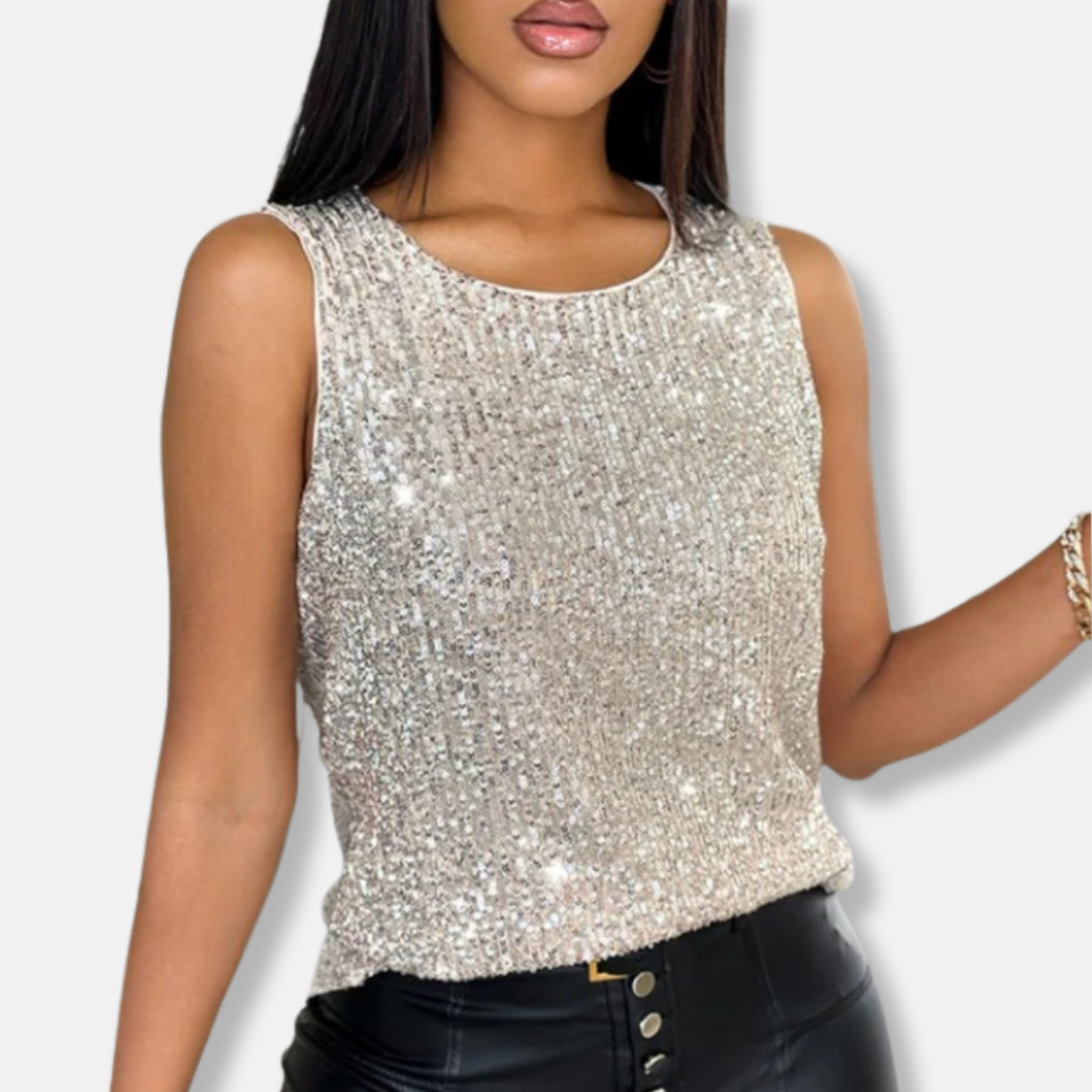 Fashionable women's sleeveless silver sequin top. Dazzling party wear, ideal for a glamorous going out look.