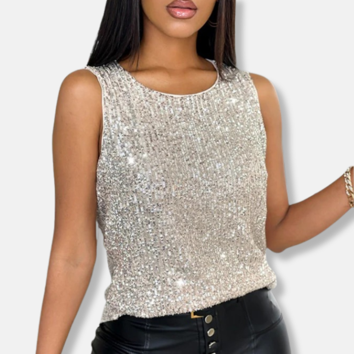 Fashionable women's sleeveless silver sequin top. Dazzling party wear, ideal for a glamorous going out look.