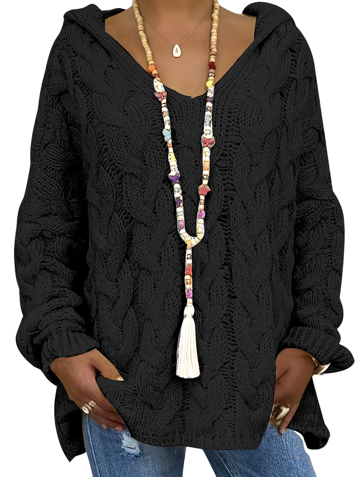 Modern women's oversized long sleeve sweatshirt. Loose fit pullover for a comfortable, casual urban style in spring.