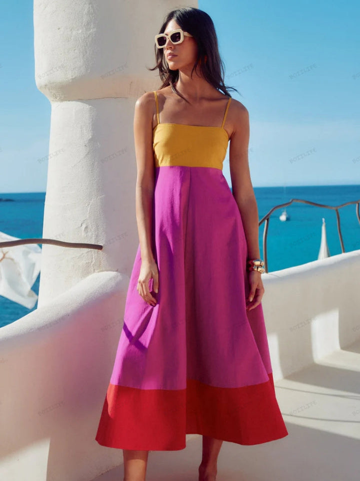 Chic women's color block spaghetti strap midi dress, perfect for summer casual or elegant vacation wear.