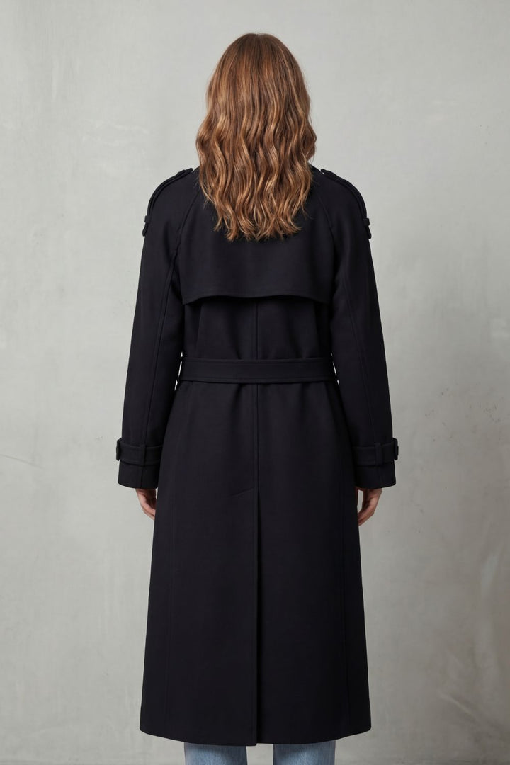 Elegant women's long trench coat, an oversized fashion jacket for chic autumn and winter layering style.