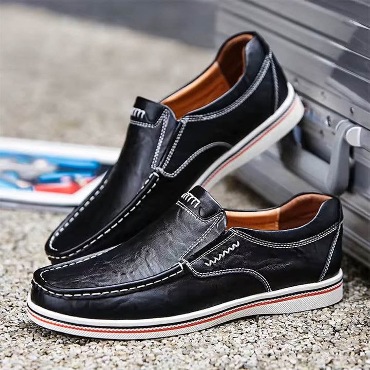 Refined men's loafers for everyday style. Comfortable, elegant slip-on footwear, perfect for formal & casual wear.