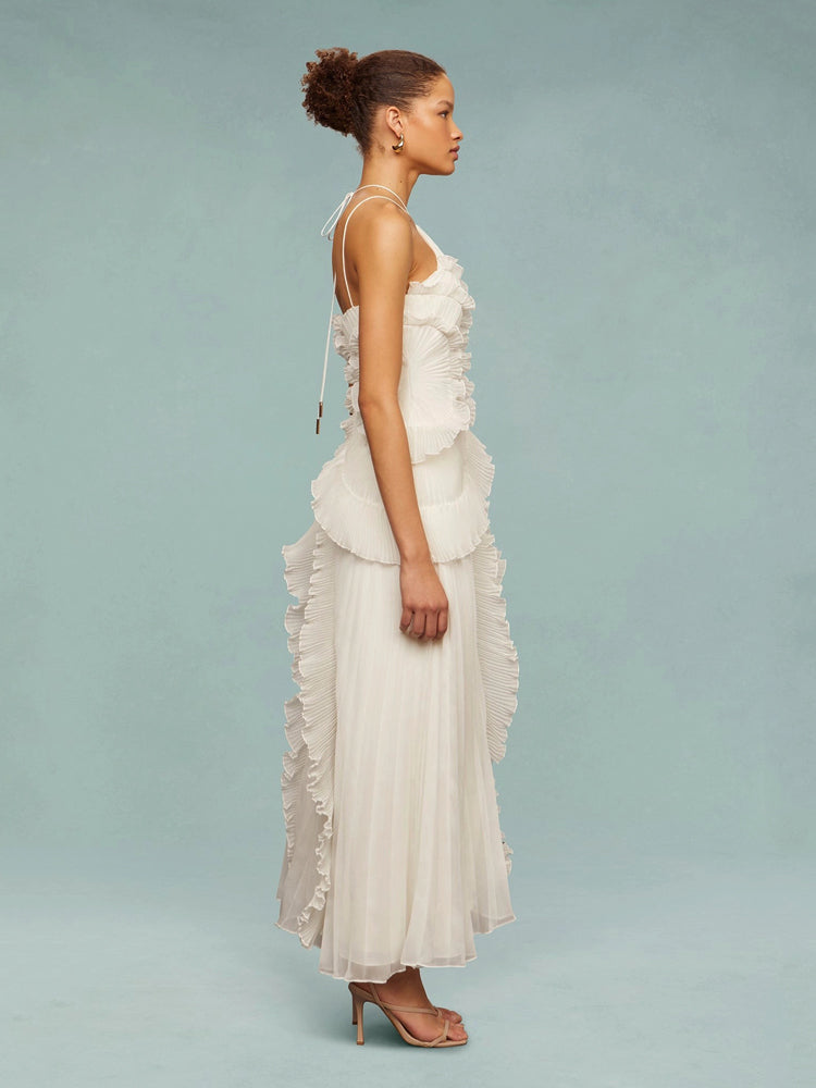 Perfect wedding guest dress: a sleeveless pleated maxi with unique asymmetric cut.