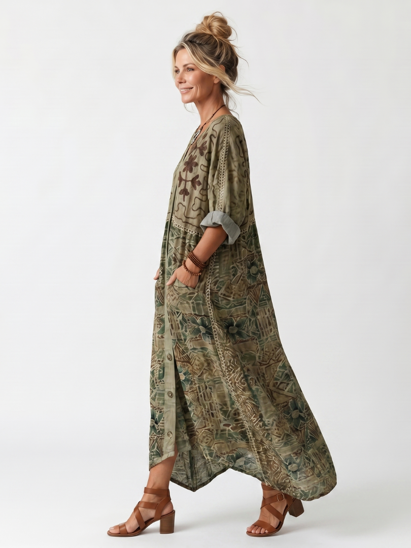 Embroidered v-neck midi dress for women, featuring a button front, pockets, and a comfortable, relaxed fit.
