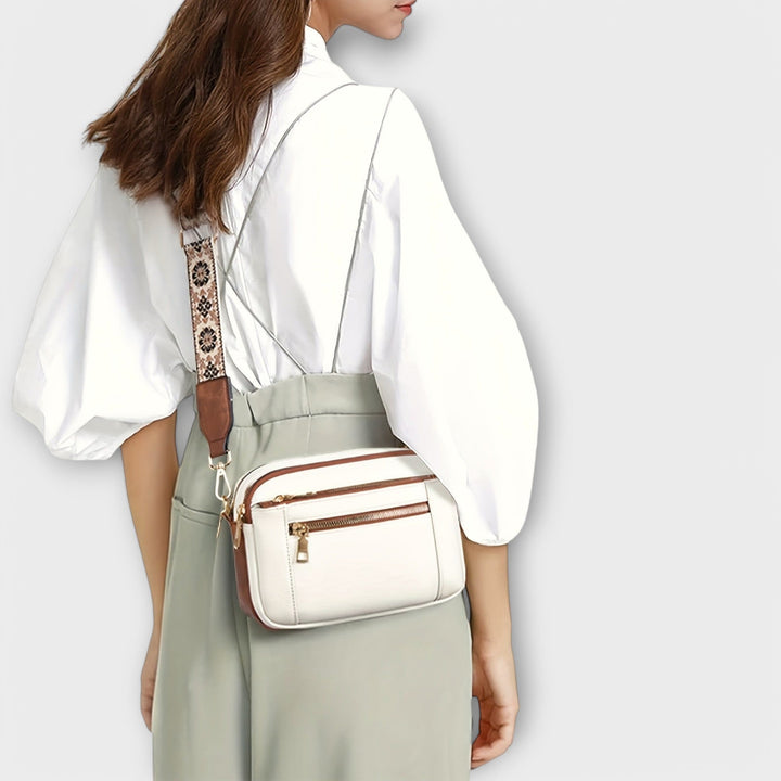 Boho chic women's retro crossbody bag, vegan leather, with a beautifully woven adjustable strap.