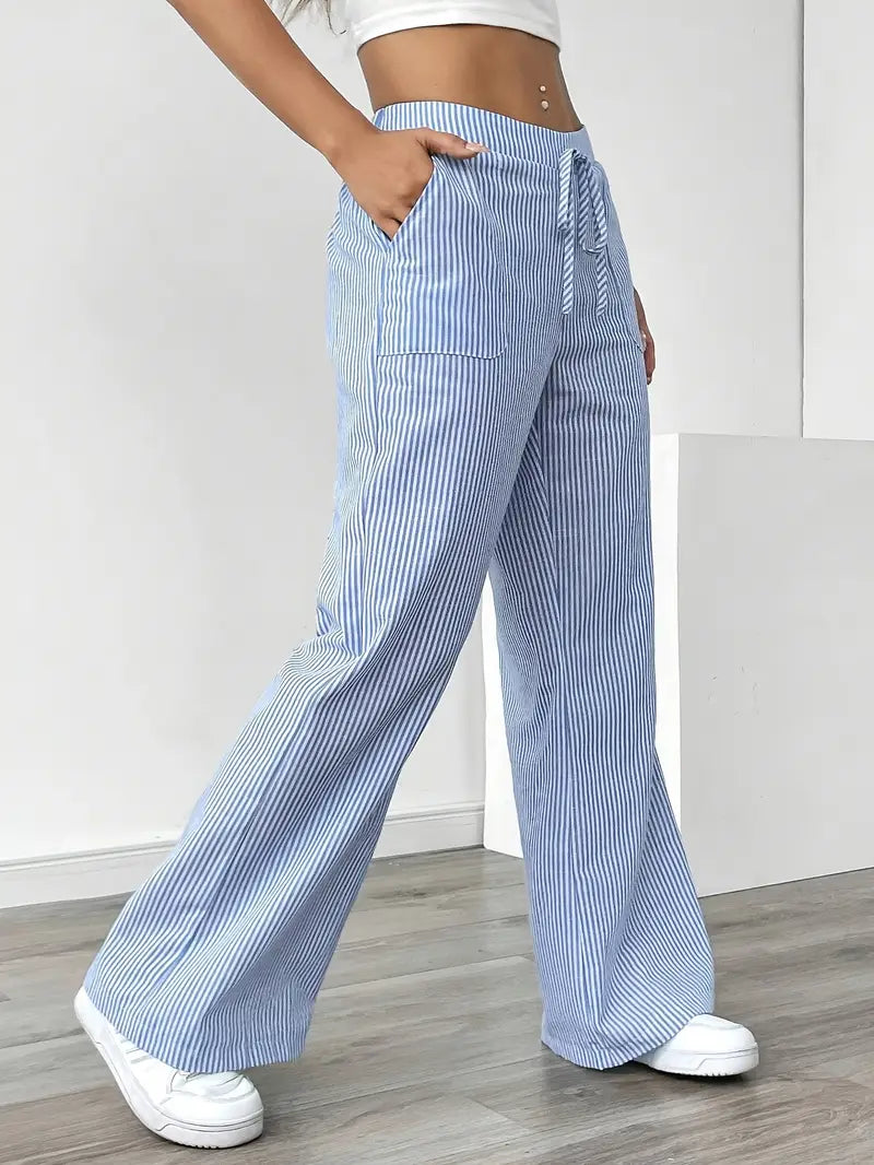 Elegant women's wide leg pants, fine stripes, side pockets, summer-ready.