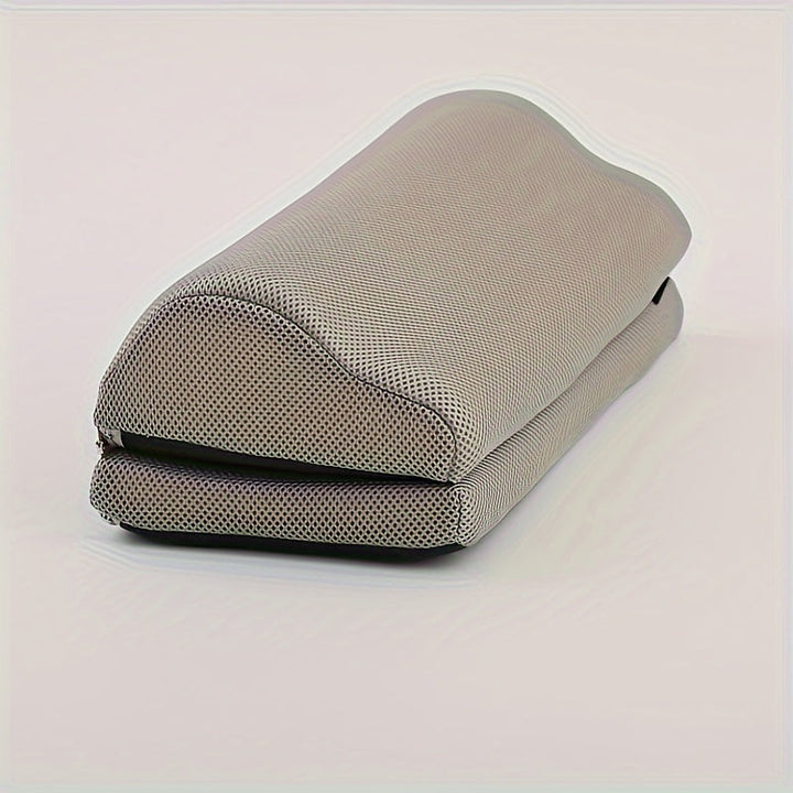 Ergonomic footrest under an office desk, promoting better posture and support during long work hours.