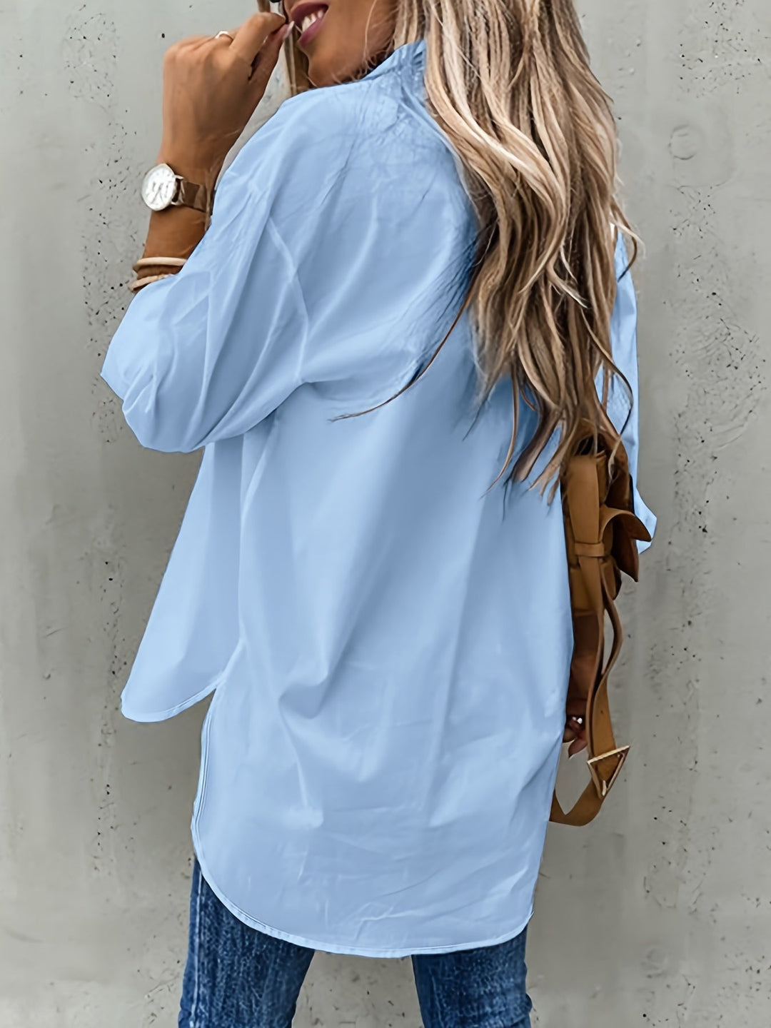 Women's elegant lapel collar blouse, a comfortable long sleeve shirt suitable for business casual fashion.
