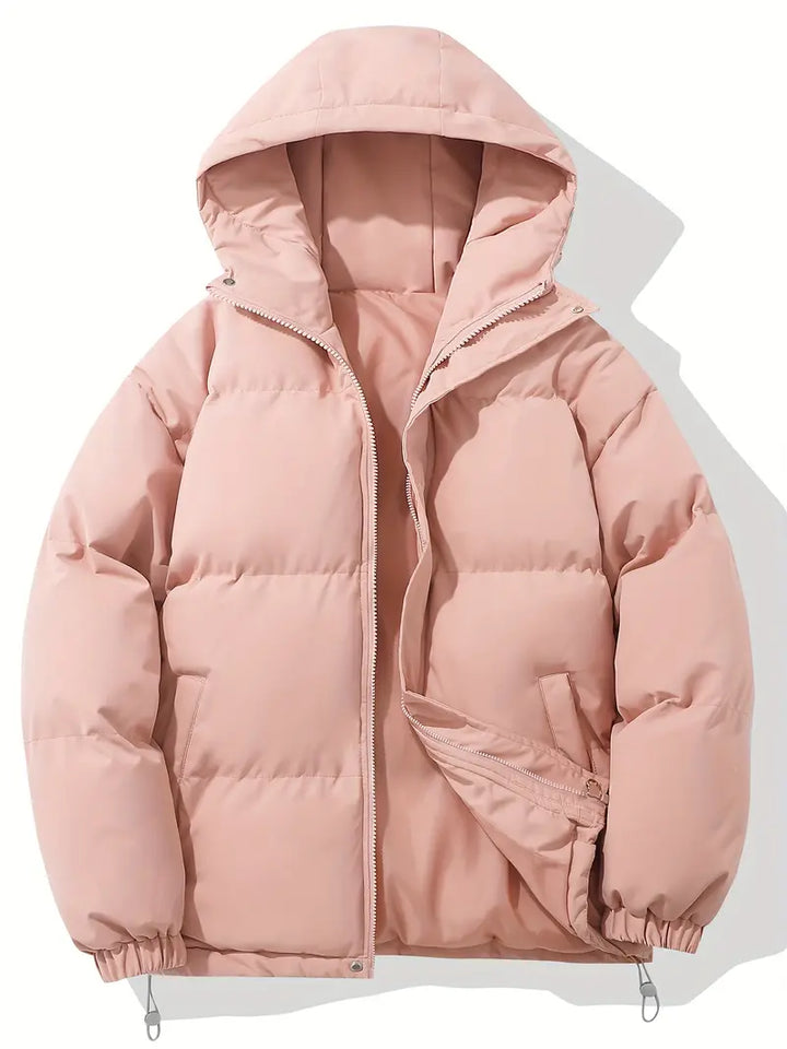 Detailed view of a women's quilted puffer jacket, highlighting its cozy texture and functional winter design.