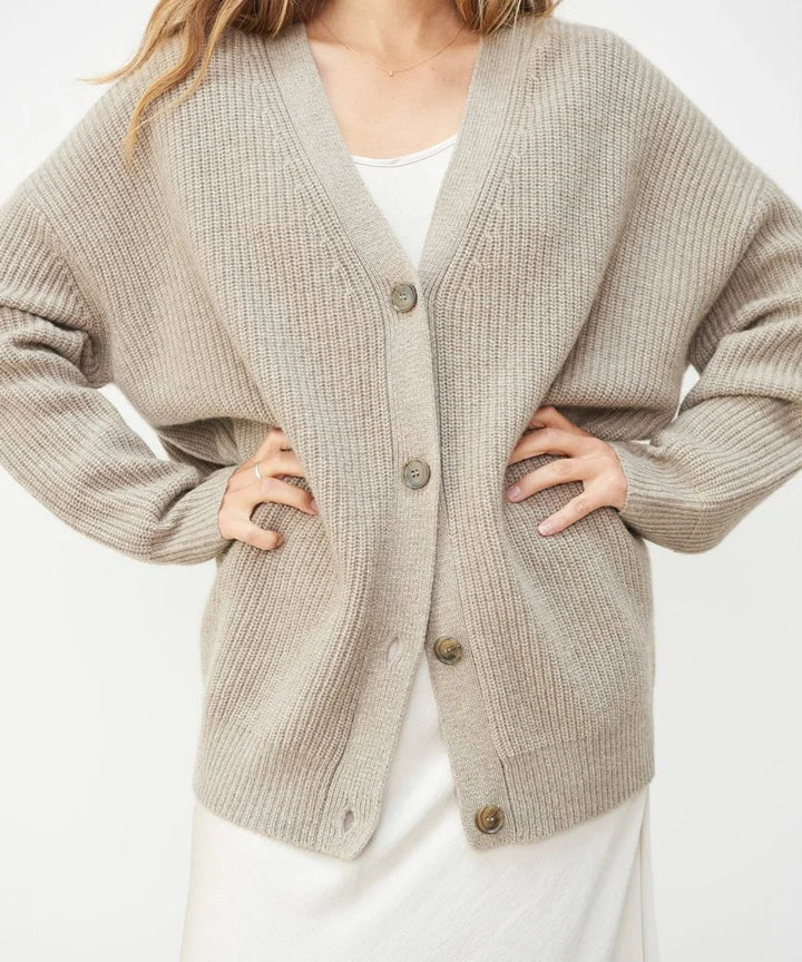 Elegant women's knit cardigan in a versatile color, perfect for timeless style and layering.
