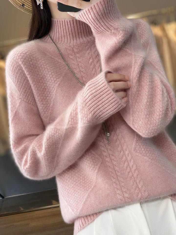 Pink women's luxurious cashmere roll neck jumper, classic cable knit for ultimate comfort.
