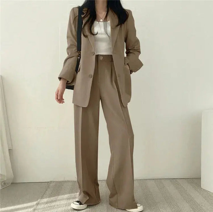 High-quality fabric detail of women's elegant tailored business suit.