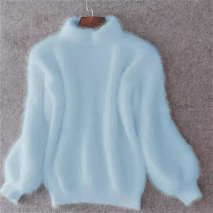 Women's vintage-inspired cozy pullover sweater with long sleeves & round neck for fall/winter fashion.