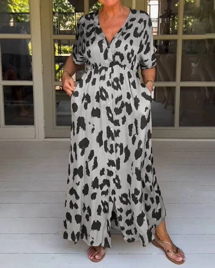 Chic v-neck leopard print maxi dress. This flowy long women's dress is perfect for elegant or casual summer wear.