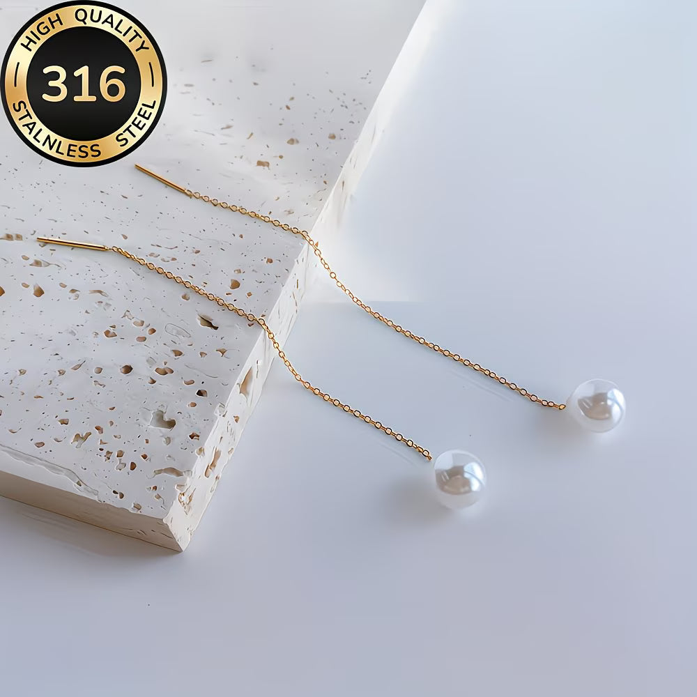 Fashionable pearl tassel earrings for women. Elegant long dangle jewellery, a chic accessory choice.