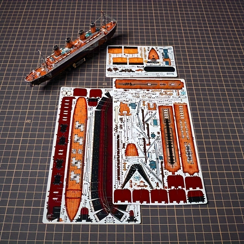 High-angle shot of a completed Titanic 3D metal model kit, detailed ship replica, great adult craft project.