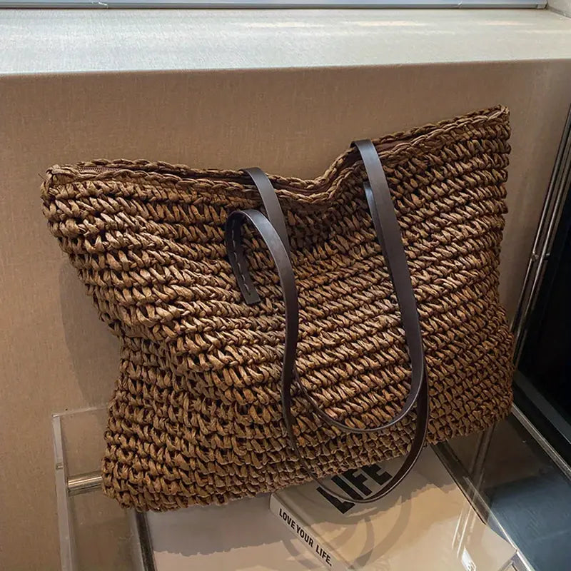 Bohemian large woven tote bag, a fashionable shoulder carryall for women's summer adventures.