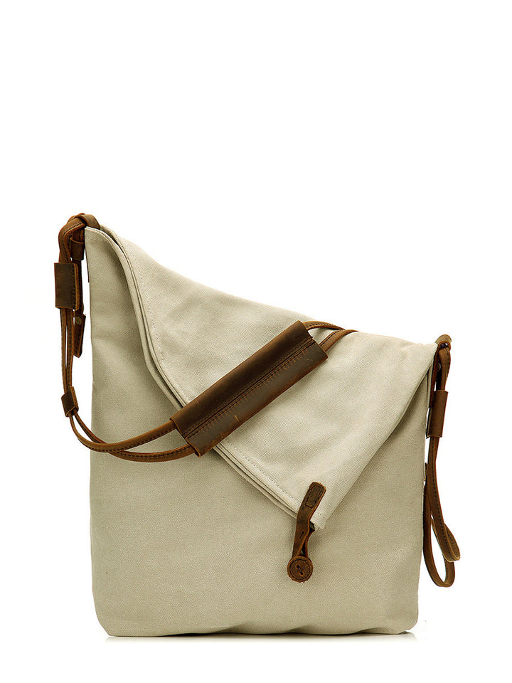 Elegant women's shoulder bag with a unique asymmetrical and slouchy silhouette.