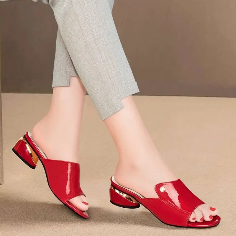 Versatile glossy women's slides; elegant open-toe design provides comfort for any summer occasion.