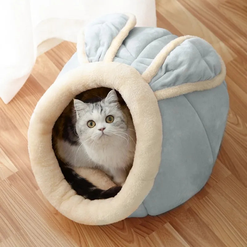 Soft cat ear design pet cave bed, a cozy snuggle retreat for felines. Ideal kitty haven.