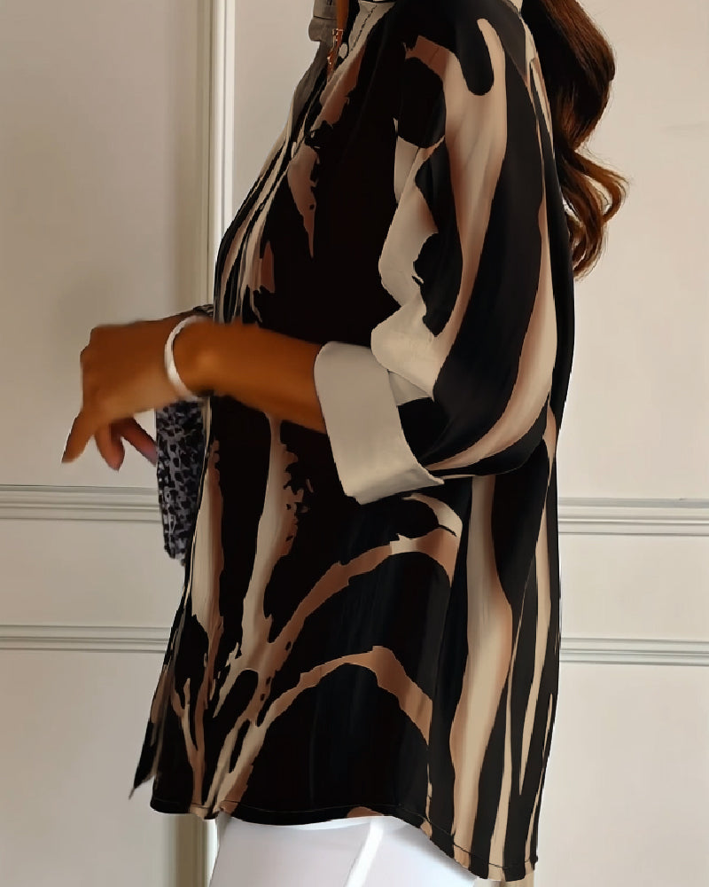 Stylish women's long sleeve blouse with irregular print & stand collar, ideal for casual outfits. Autumn fashion.
