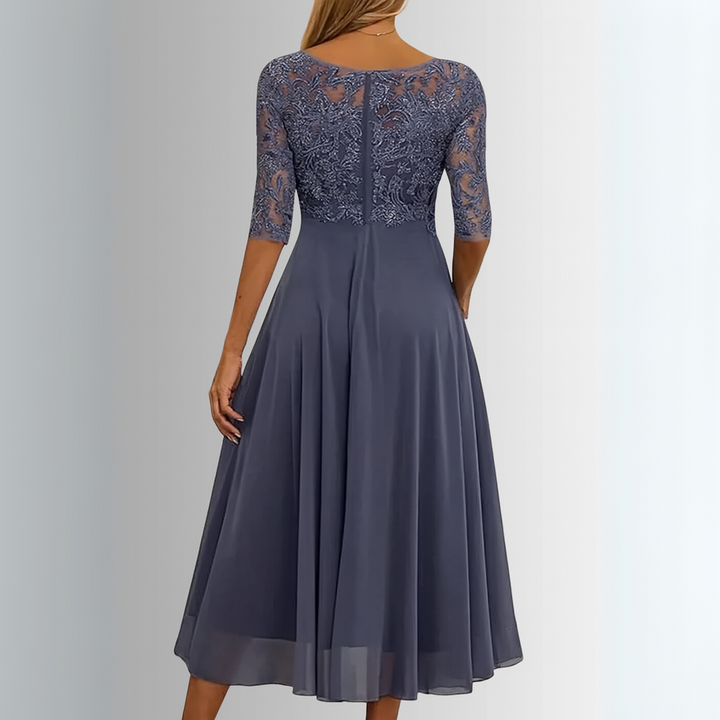 Women's elegant lace top midi dress with stylish half sleeves. Perfect A-line evening and occasionwear fashion.